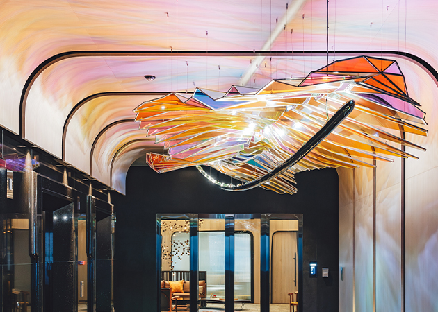 Glittering, Lighting Design Awards winning artwork hung in the Farglory headquarters elevator lobby